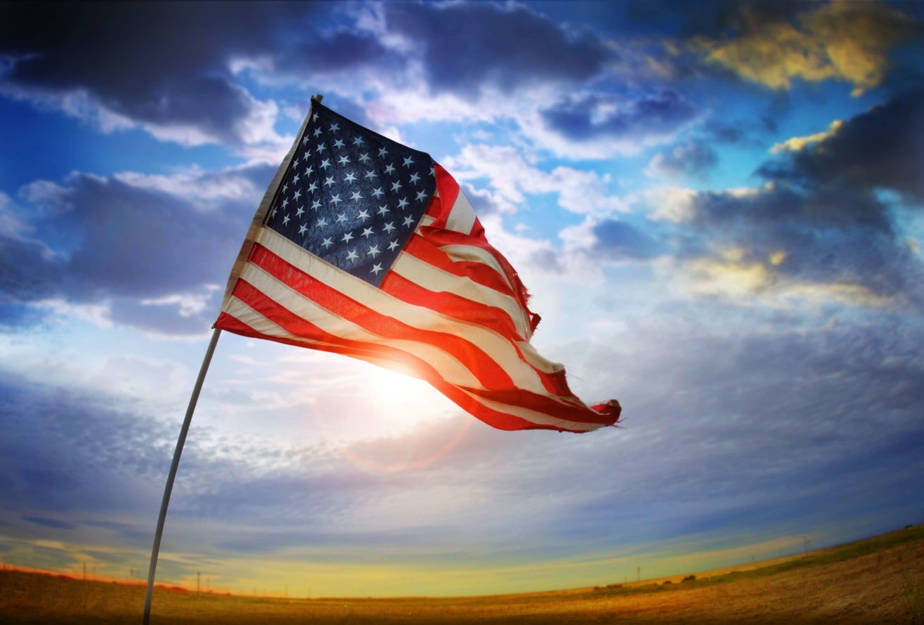 American flag outside blowing in the wind