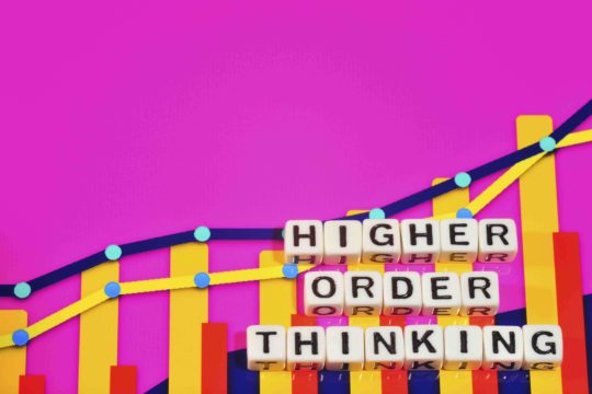 Words ‘Higher Order Thinking’ spelled out in blocks with a pink background