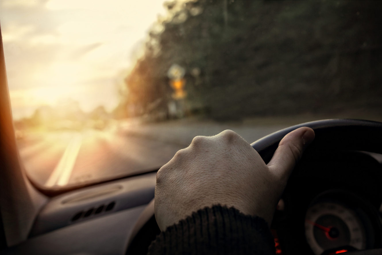 Hand on the steering while driving