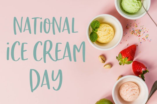 The text ‘National Ice Cream Day’ surrounded by ice cream and toppings.